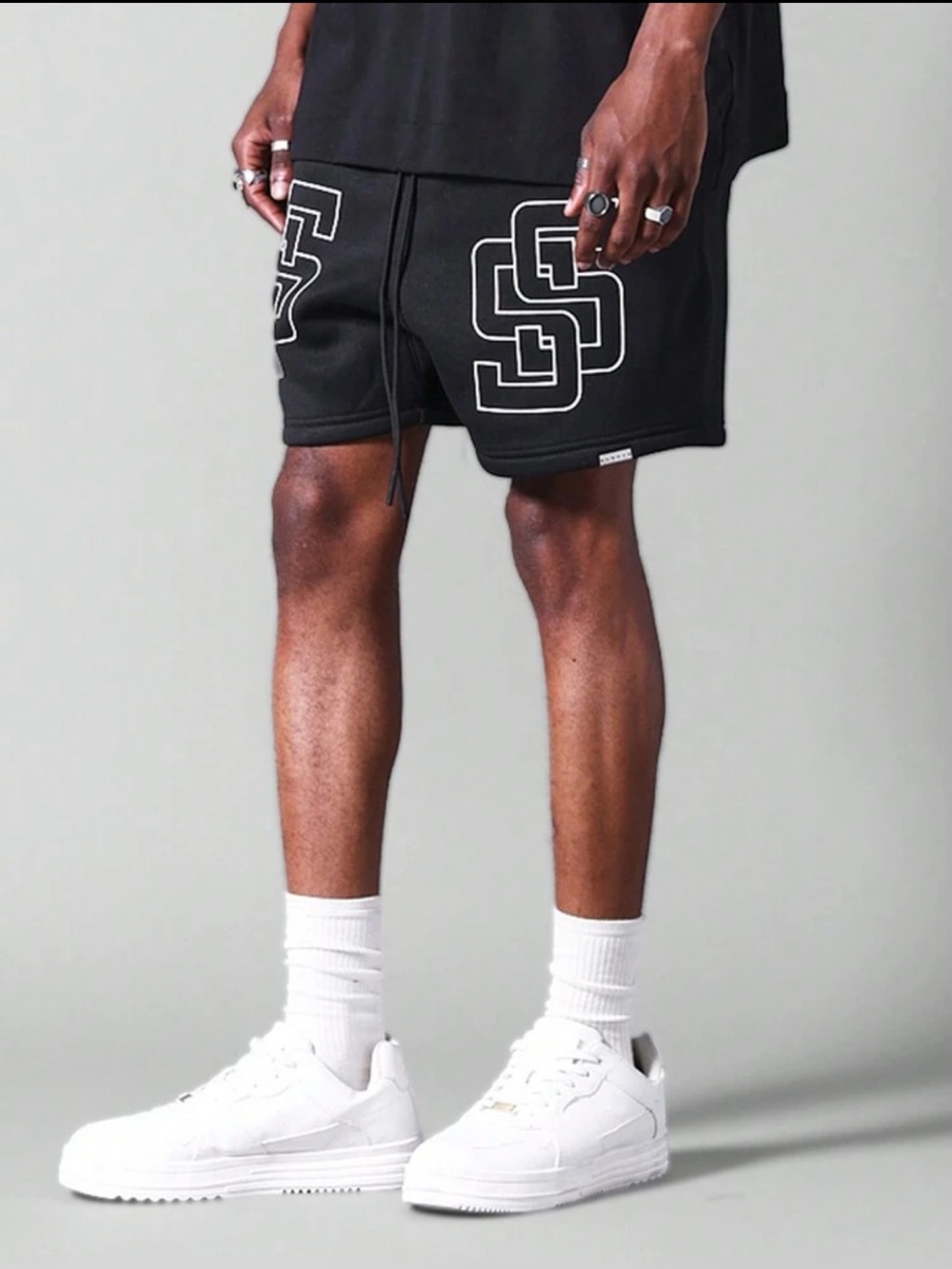 SUMWON Black Drop Crotch Shorts With Front Design